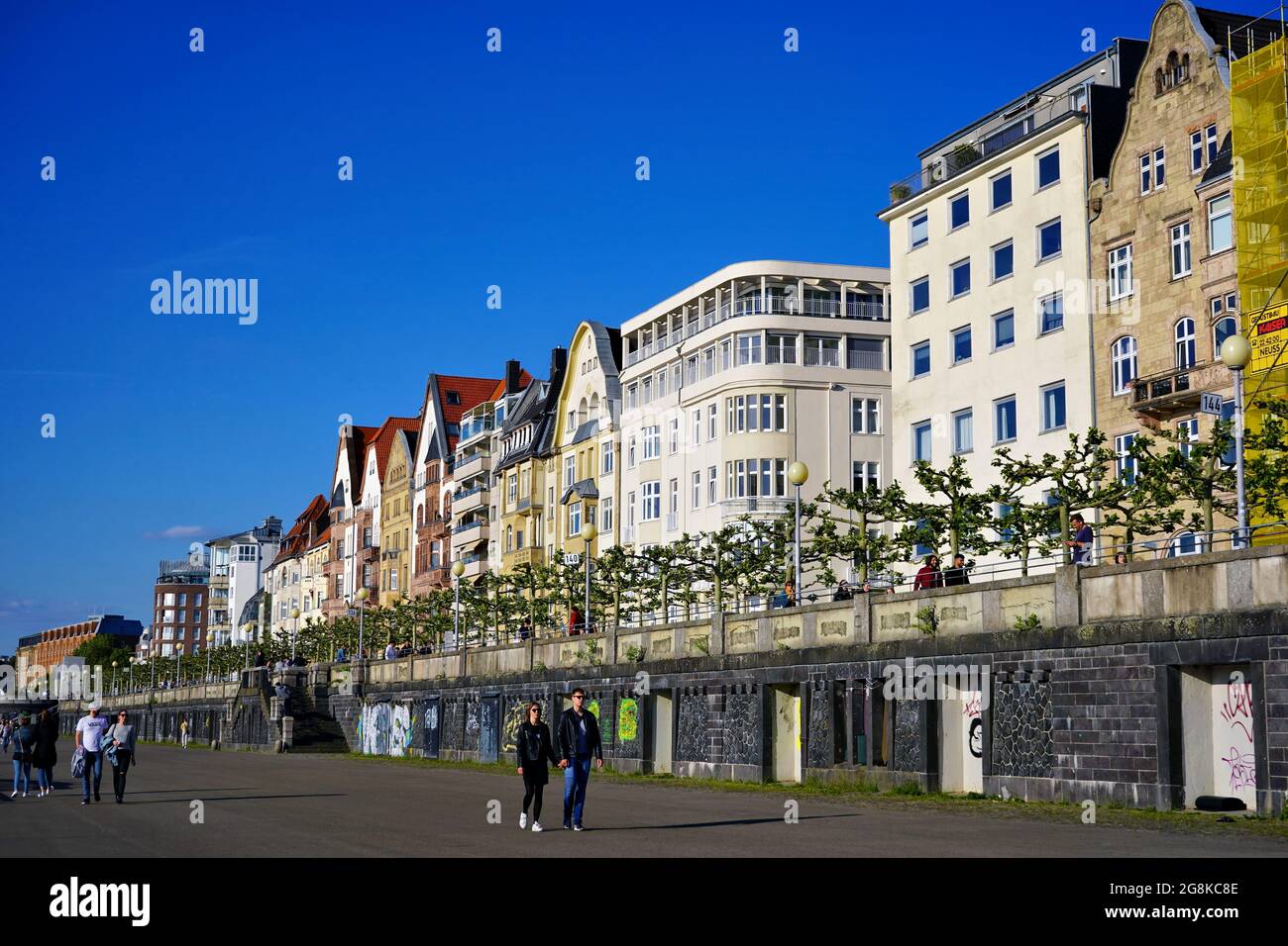 Mannesmannufer (river promenade) at the Rhine river in Düsseldorf, Germany, with beautiful private house fronts. Stock Photo