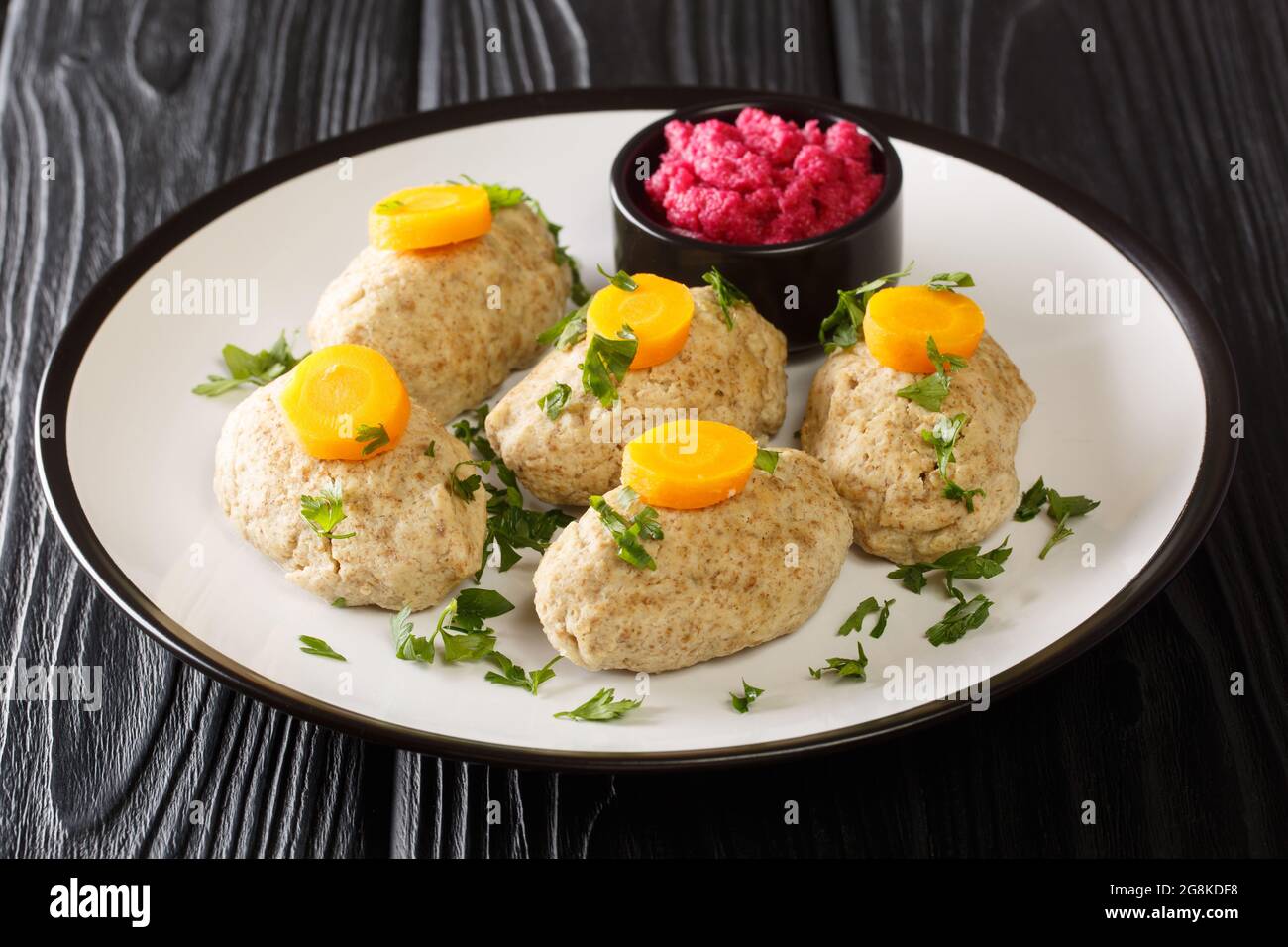 Delicious Jewish Gefilte Fish for Passover with horseradish and carrots
