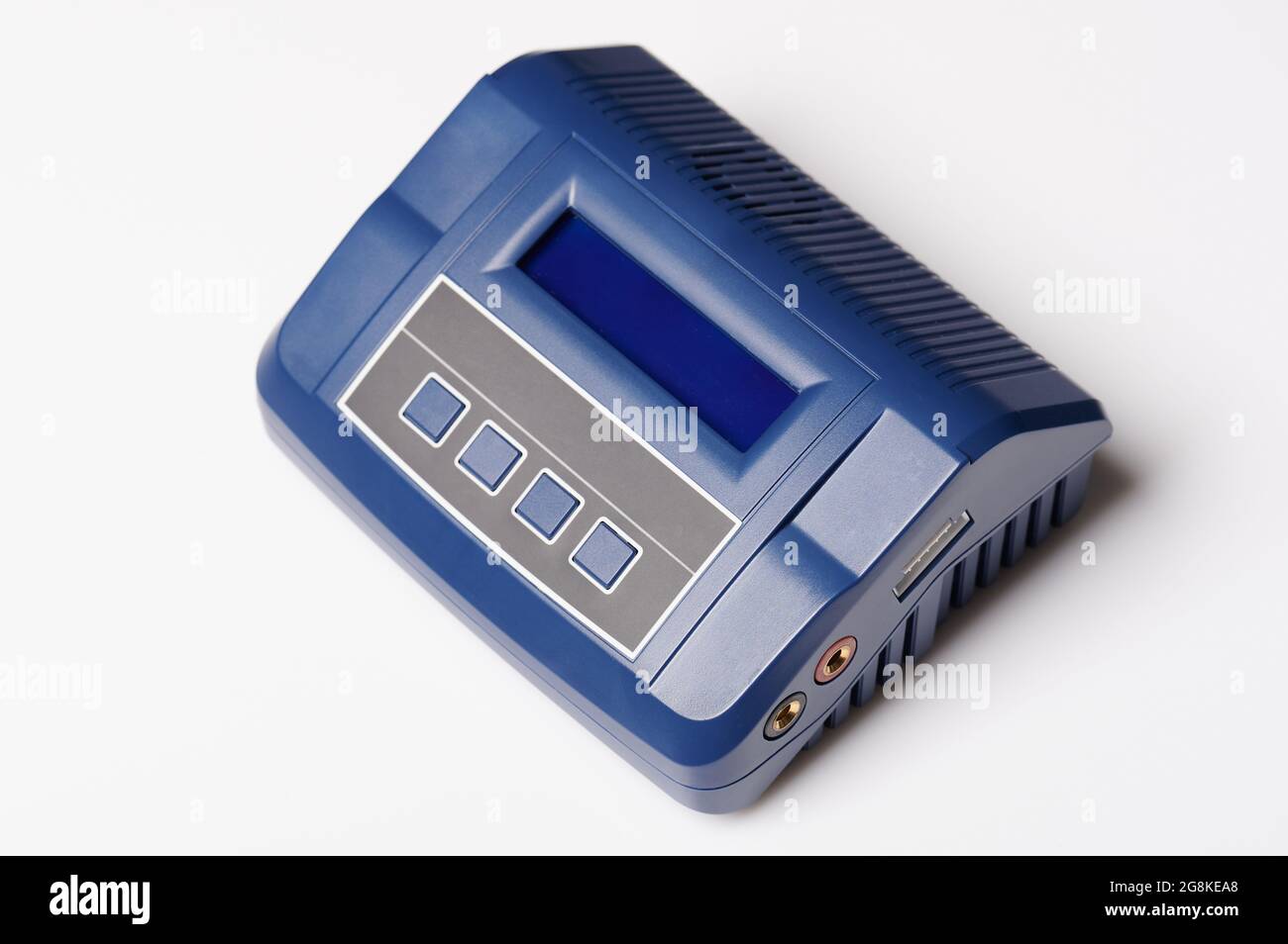 Blue professioanl charger with screen and buttons isolated on studio background Stock Photo