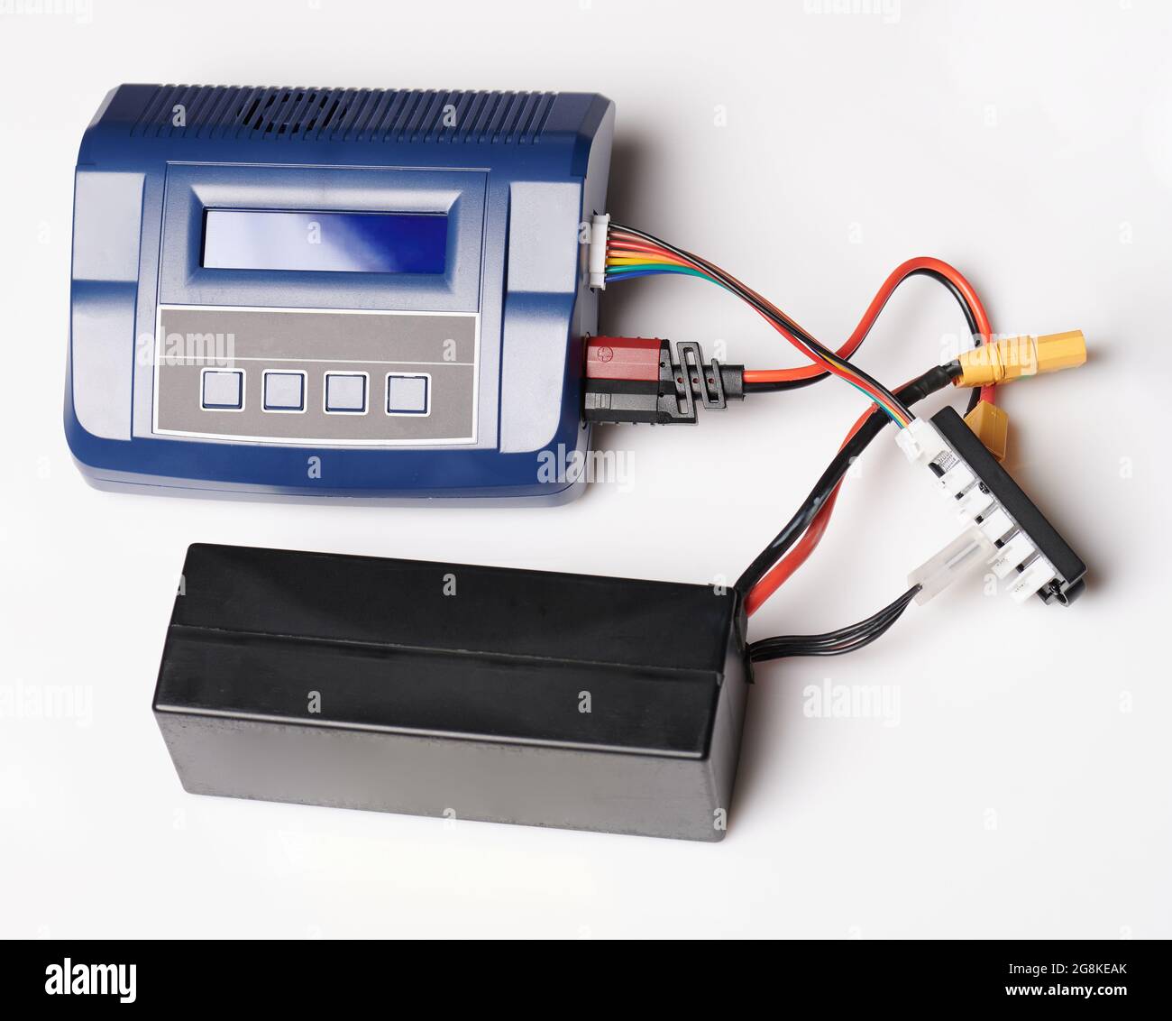 Lipo battery connected to charger above top view isolated Stock Photo