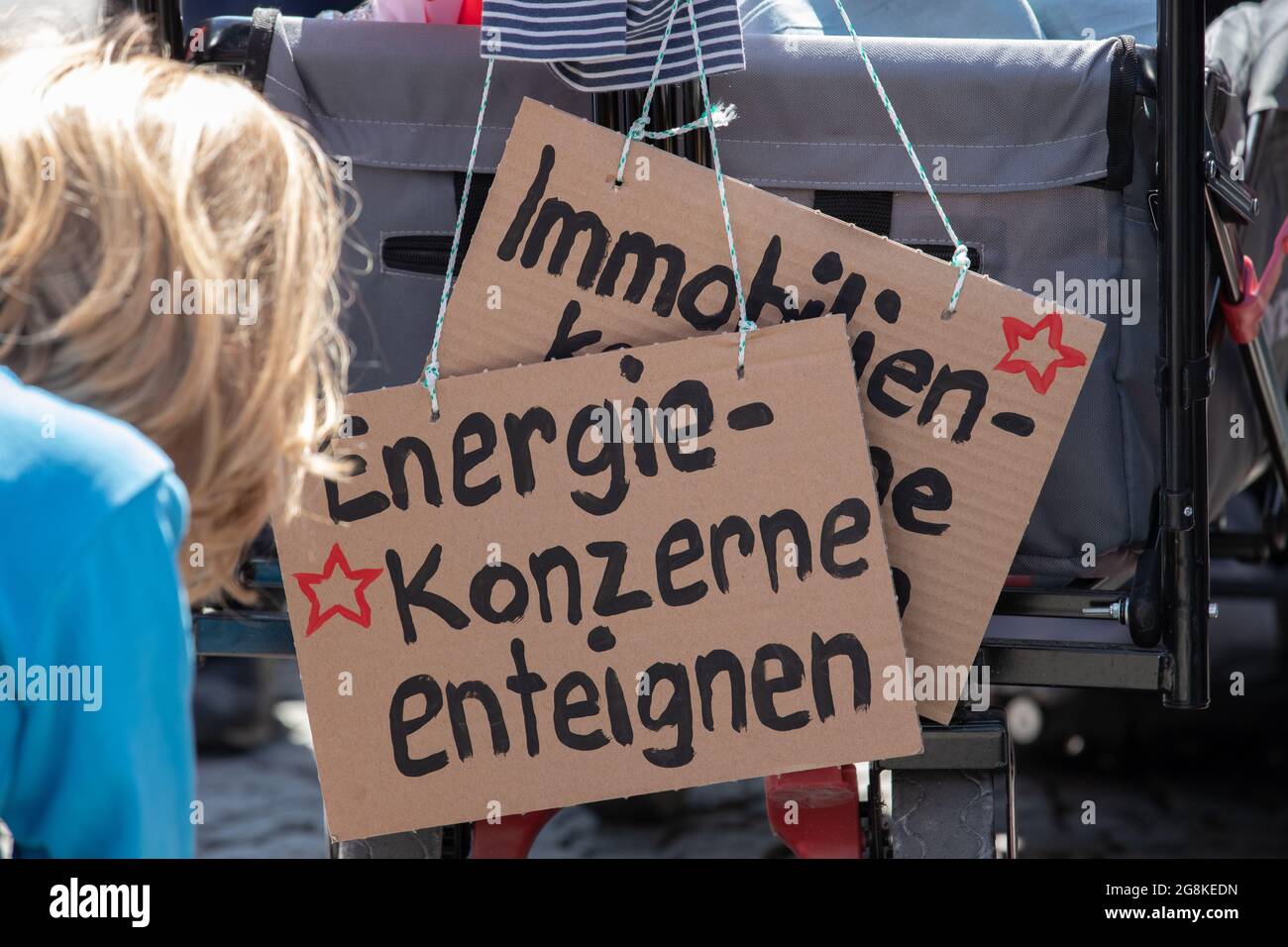Signs asking for the expropriation of energy and real estate corporations. On 1.5.2019 a few thousands people demonstrated at the MayDay protest in Munich. (Photo by Alexander Pohl/Sipa USA) Stock Photo