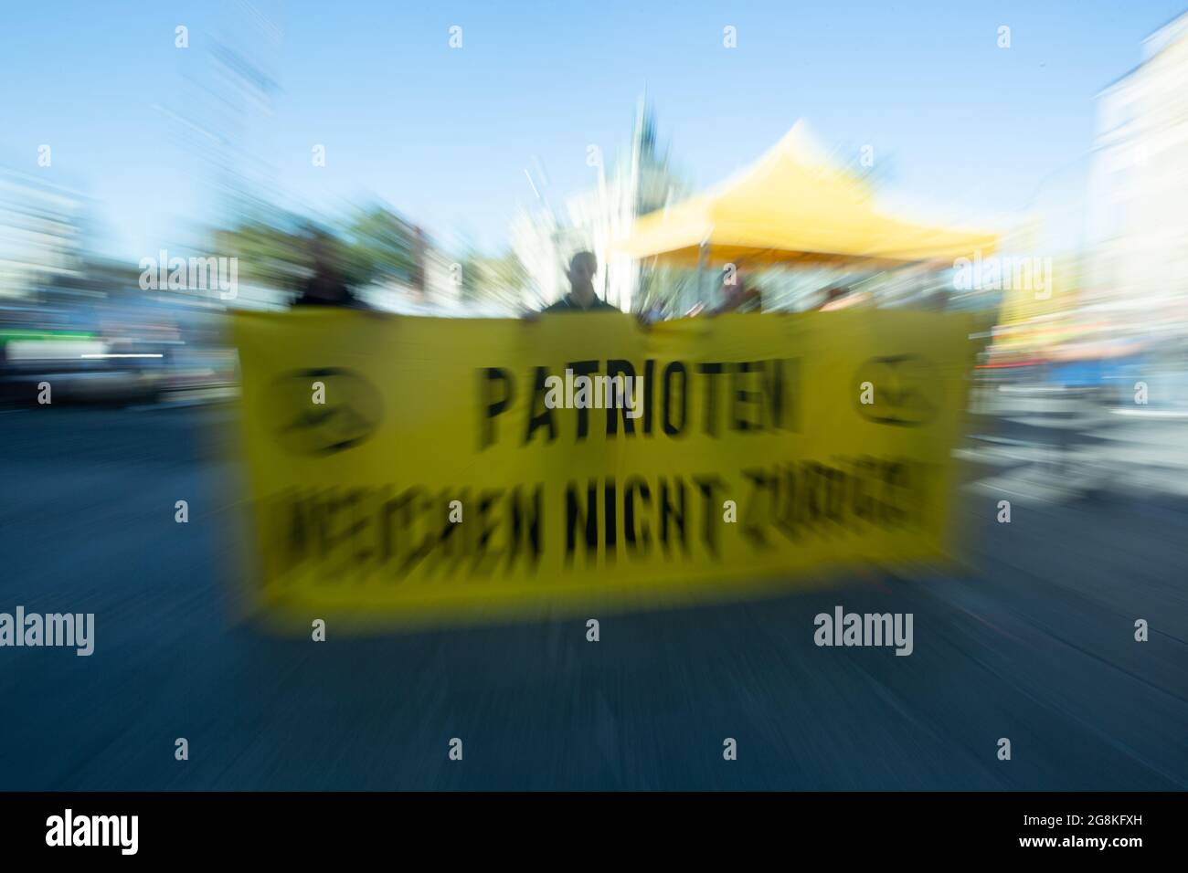Munich, Germany. 26th Oct, 2019. Banner reading ' Patriots don't retreat '. The extreme right Verfassungsschutz surveilled Identitaere Bewegung held a rally on 26. October 2016 in Munich. (Photo by Alexander Pohl/Sipa USA) Credit: Sipa USA/Alamy Live News Stock Photo