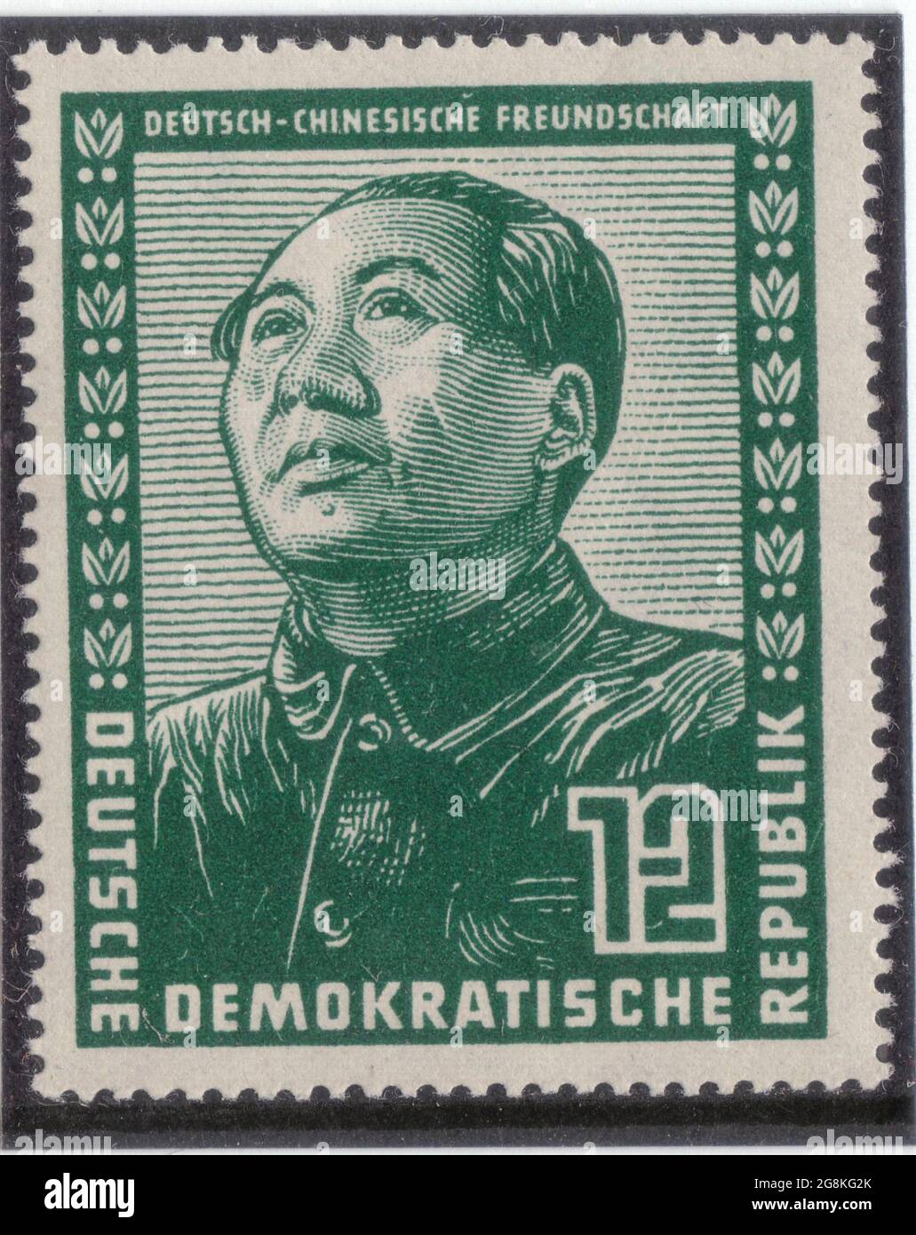 DDR [Deutsche Demokratische Republik (German Democratic Republic), official name of the former East Germany] Depicting Mao Zedong [Mao Tse-tung] 12pf Green Stock Photo