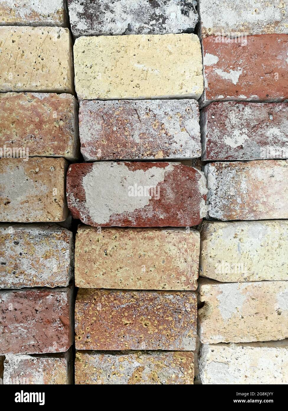 Vertical shot of some stacked colorful bricks Stock Photo - Alamy