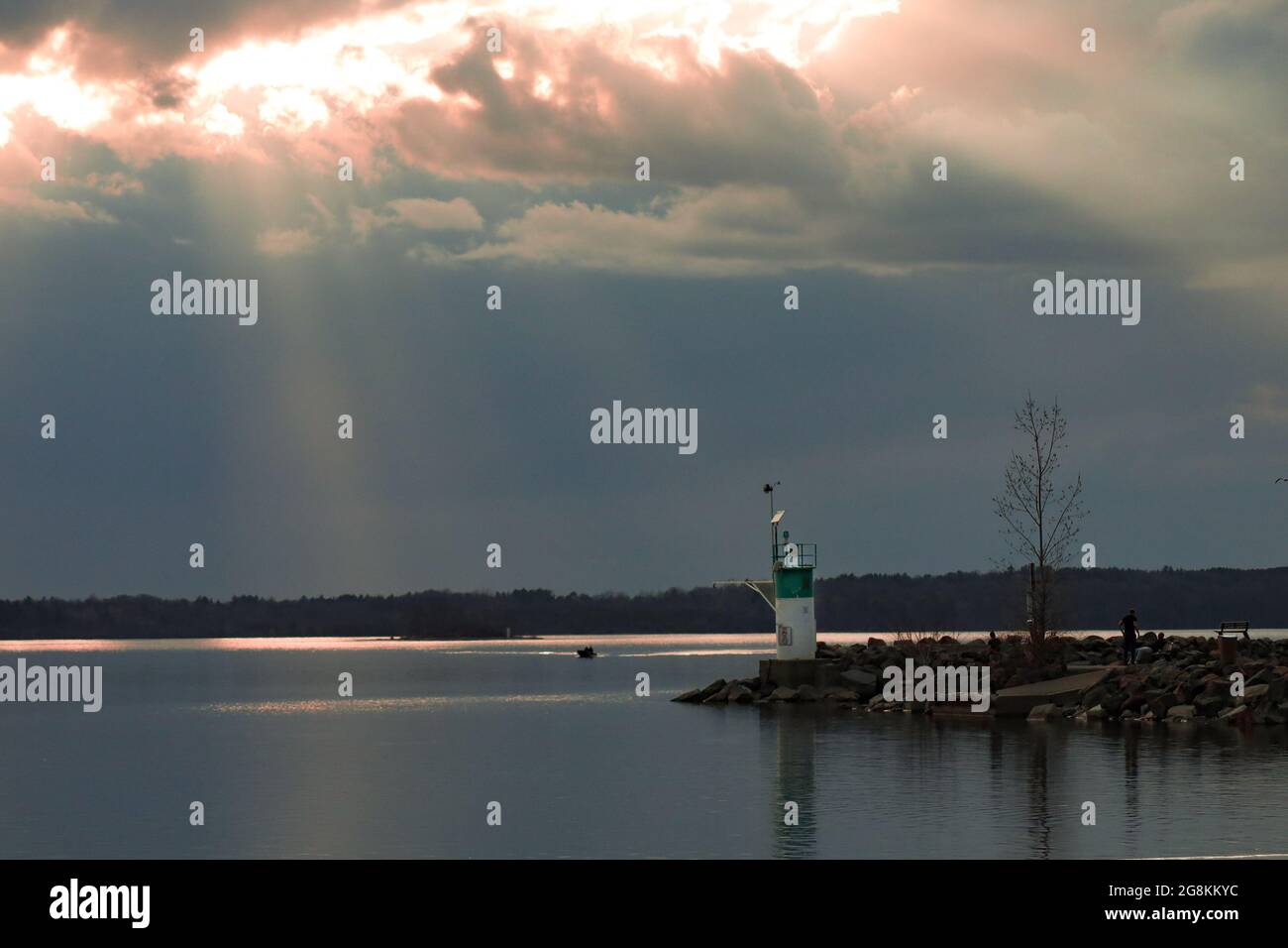 Sunset over a lighthouse in the Ottawa river Stock Photo