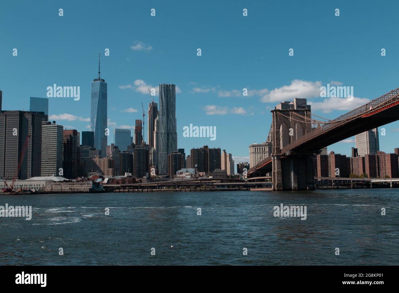 Blue sky over the skyscrapers and buildings of New York City, USA Stock ...