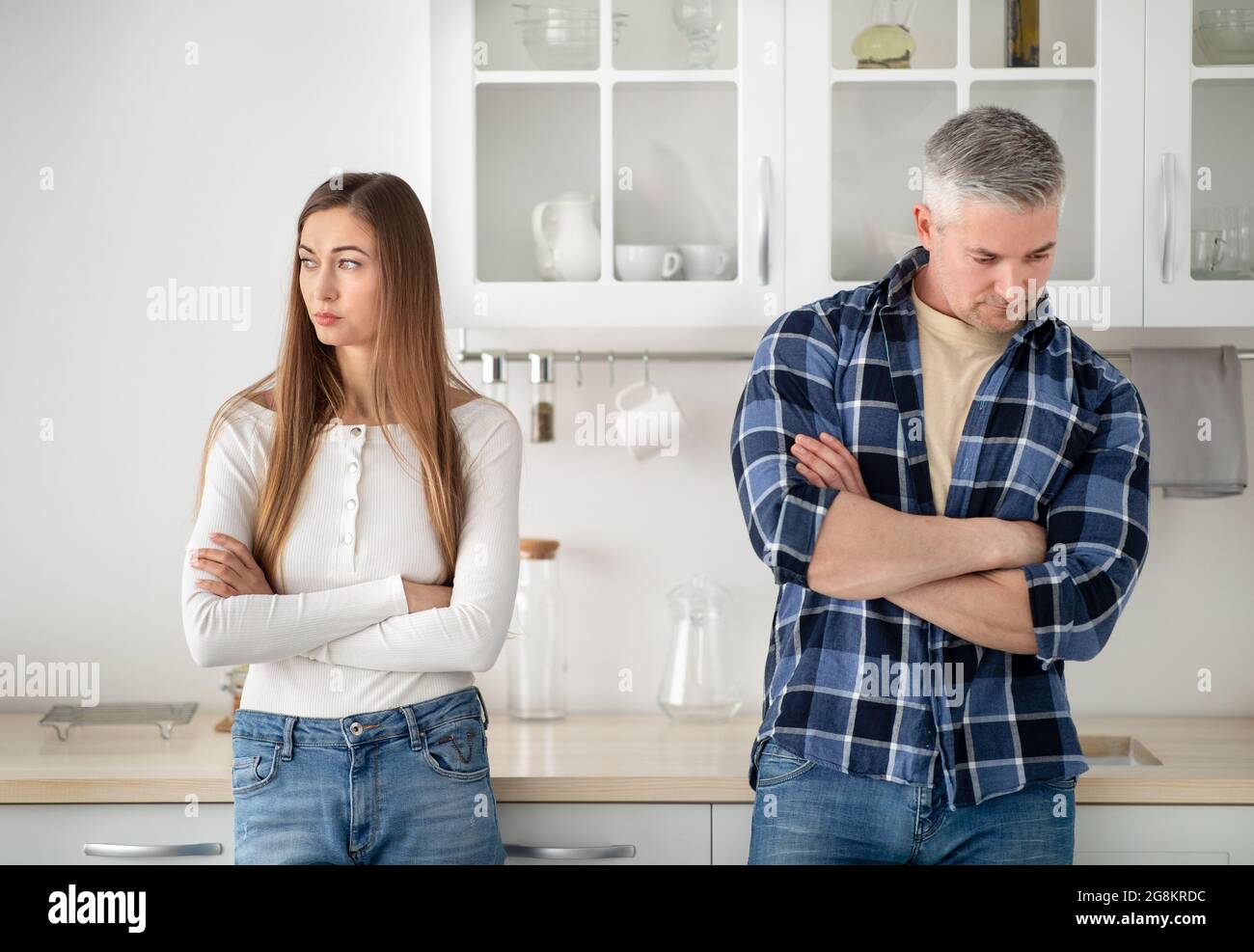 Couple standing in kitchen hi-res stock photography and images - Alamy