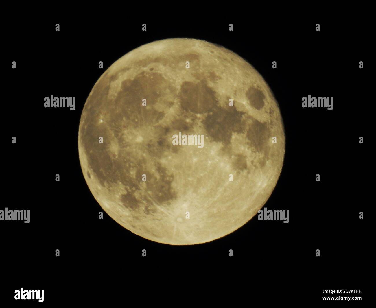 Strawberry full moon of June 2021 over Old Bridge, New Jersey, in sepia against a black