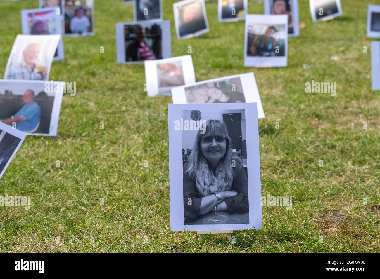 London, UK. 21st July, 2021. Covid-19 Bereaved families for Justice protest, Old Palace Yard Opposite the Houses of Parliament. 650 pictures (one for each MP) of those who have died from Covid-19 Credit: Ian Davidson/Alamy Live News Stock Photo