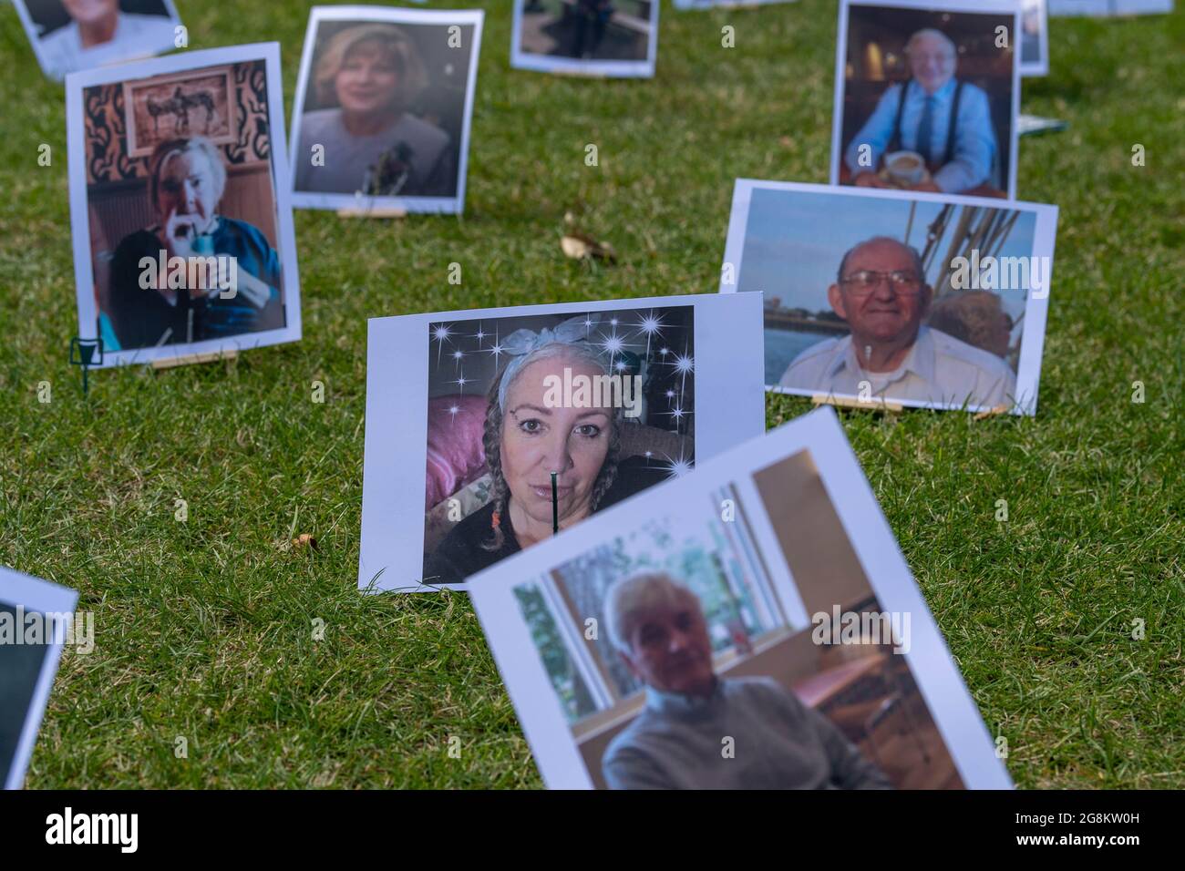 London, UK. 21st July, 2021. Covid-19 Bereaved families for Justice protest, Old Palace Yard Opposite the Houses of Parliament. 650 pictures (one for each MP) of those who have died from Covid-19 Credit: Ian Davidson/Alamy Live News Stock Photo