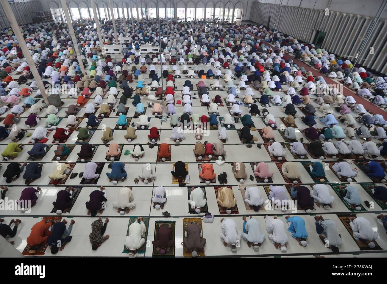 Dhaka. 21st July, 2021. People pray during the Eid al-Adha festival in Dhaka, Bangladesh, July 21, 2021. Credit: Xinhua/Alamy Live News Stock Photo