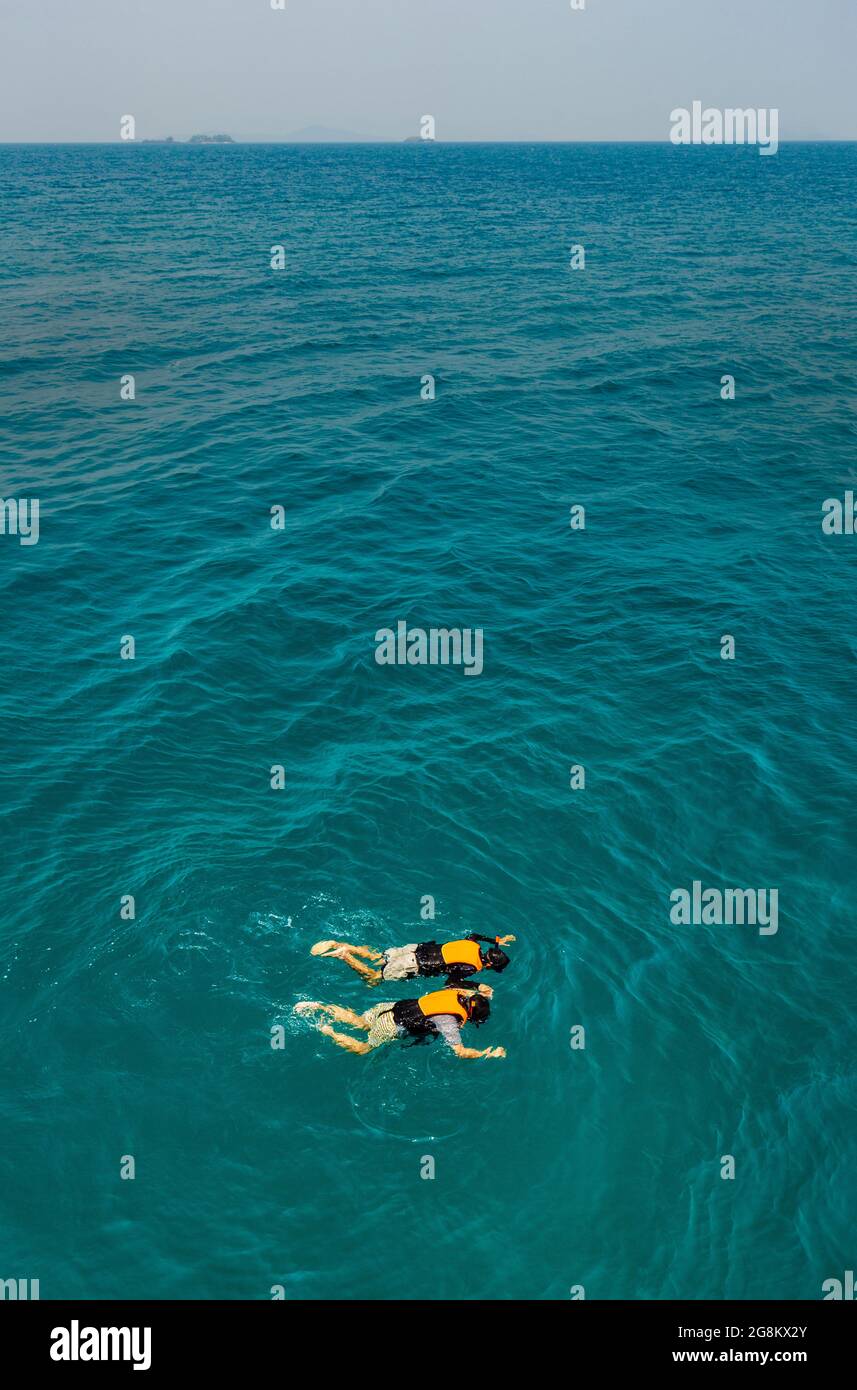 Two people man and woman catch each other hands and happy with nature