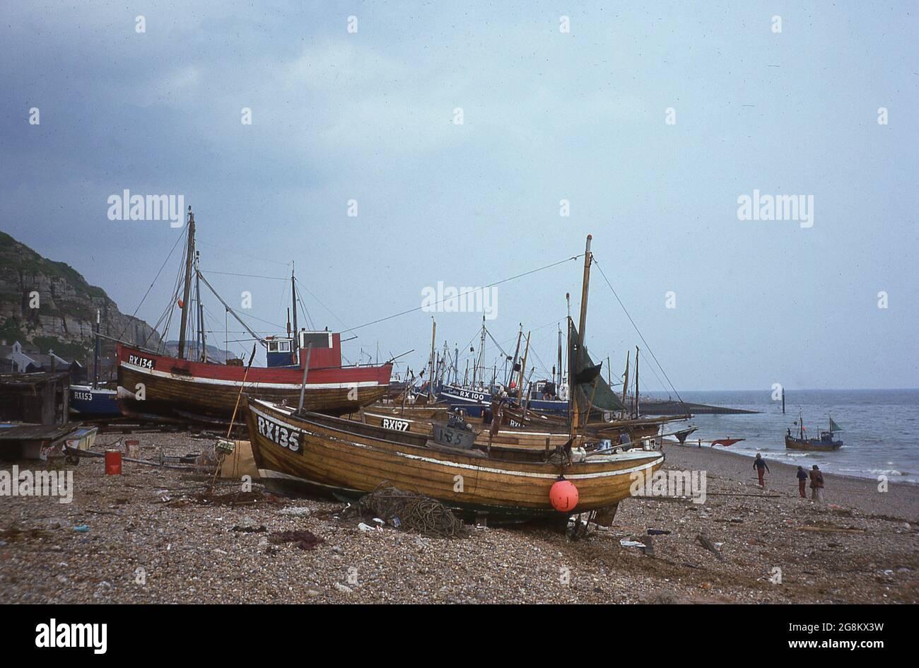 1975, traditional wooden fishing boats on The Stade, a shingle beach at ...