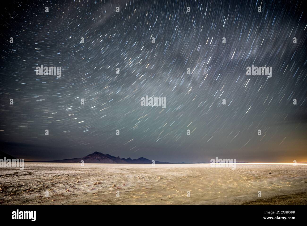 large star trails in the night sky Stock Photo