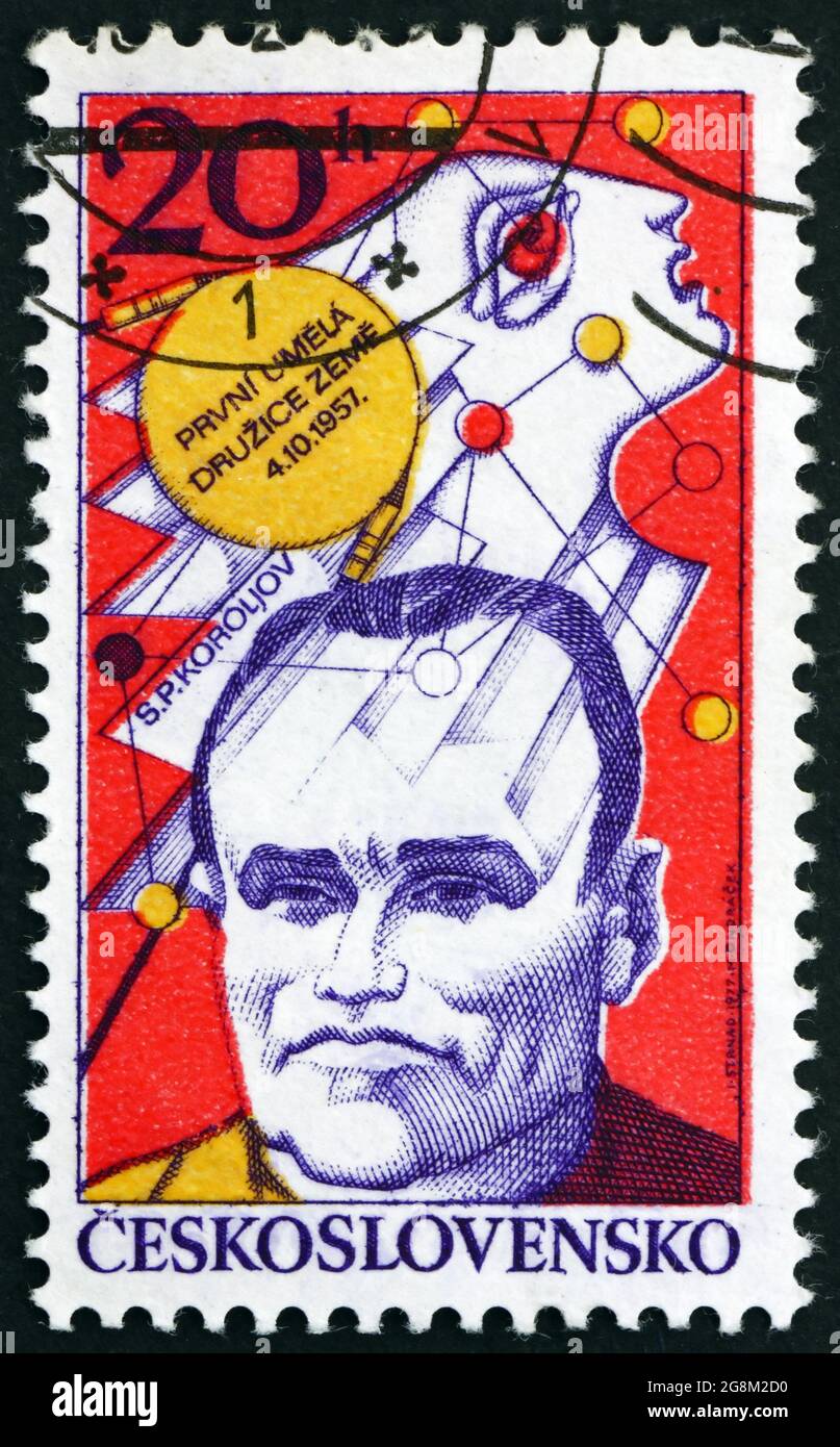 CZECHOSLOVAKIA - CIRCA 1977: a stamp printed in Czechoslovakia shows Sergei Pavlovich Korolev and Sputnik I emblem, space research, 20th anniversary o Stock Photo