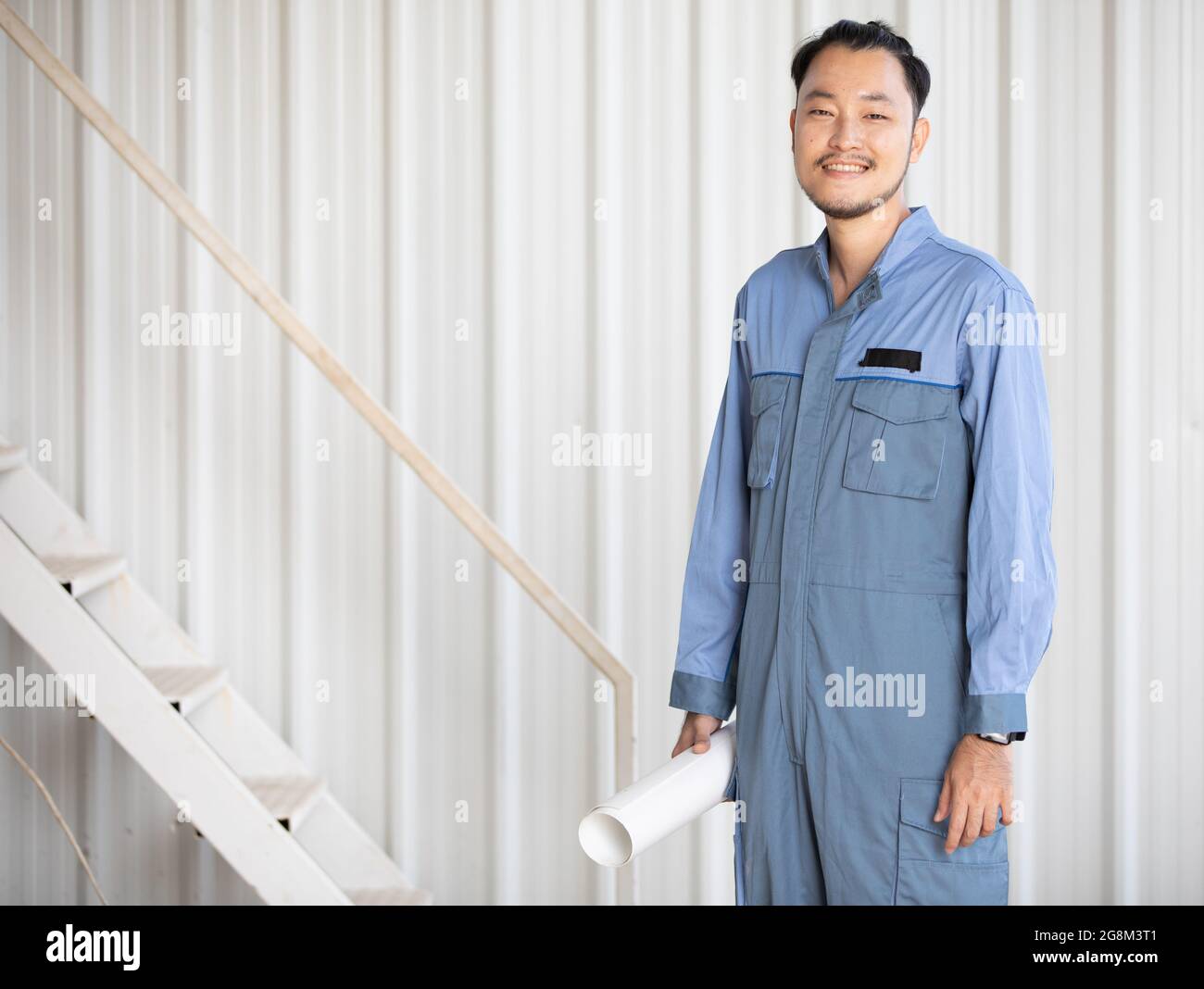 Portrait of male engineer with self-confidence and friendly manner ...