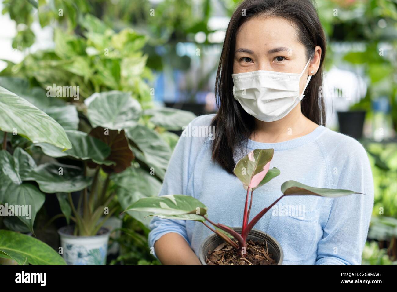 Asian female mask hi-res stock photography and images - Alamy
