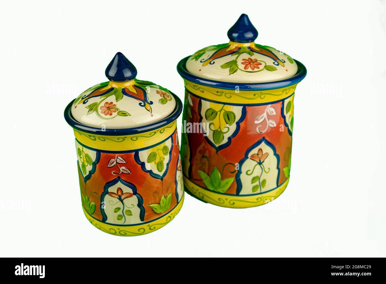 Two big coloured jars for coffee on white background Stock Photo
