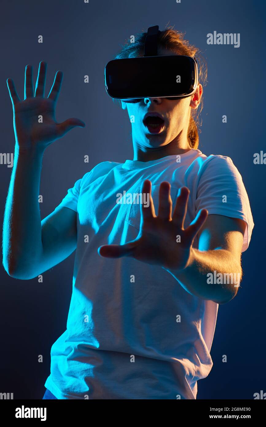 Young man using virtual reality headset. VR gadgets Stock Photo
