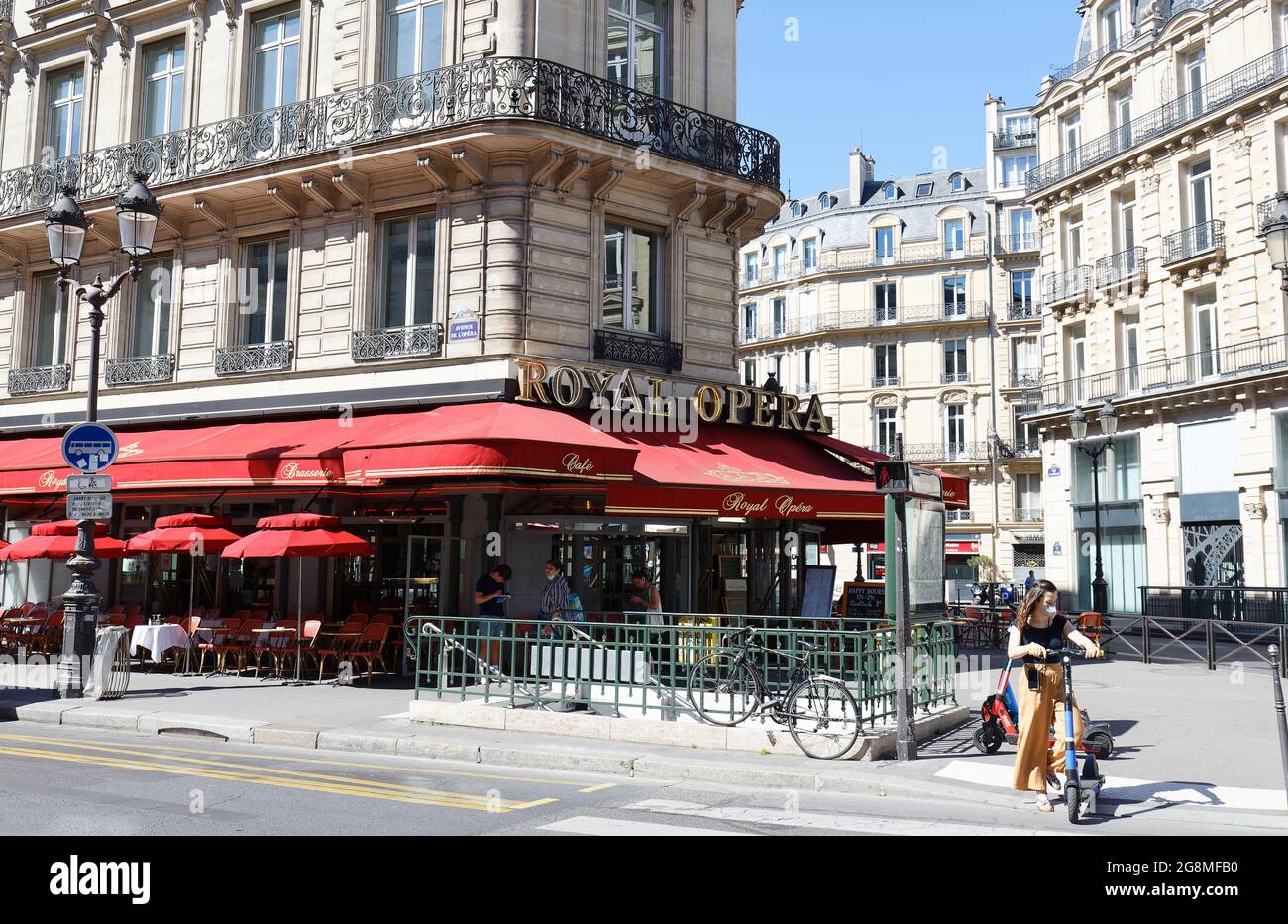 The traditional French cafe brasserie Royal Opera with unidentified clients .It is located near National Opera house in Paris, France. Stock Photo