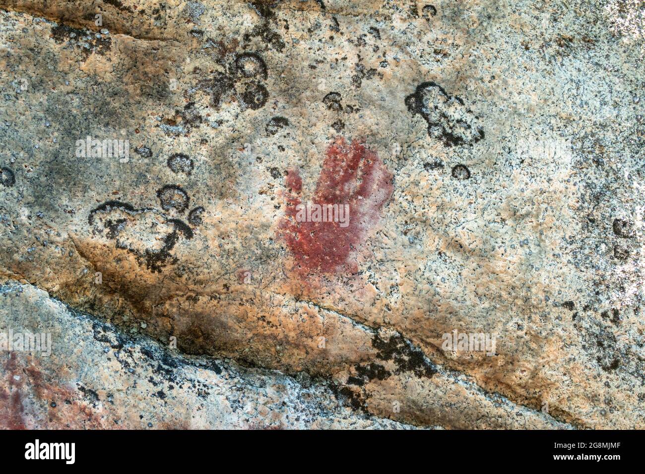 Human hand , one of Astuvansalmi rock paintings, in Ristiina, Finland Stock Photo