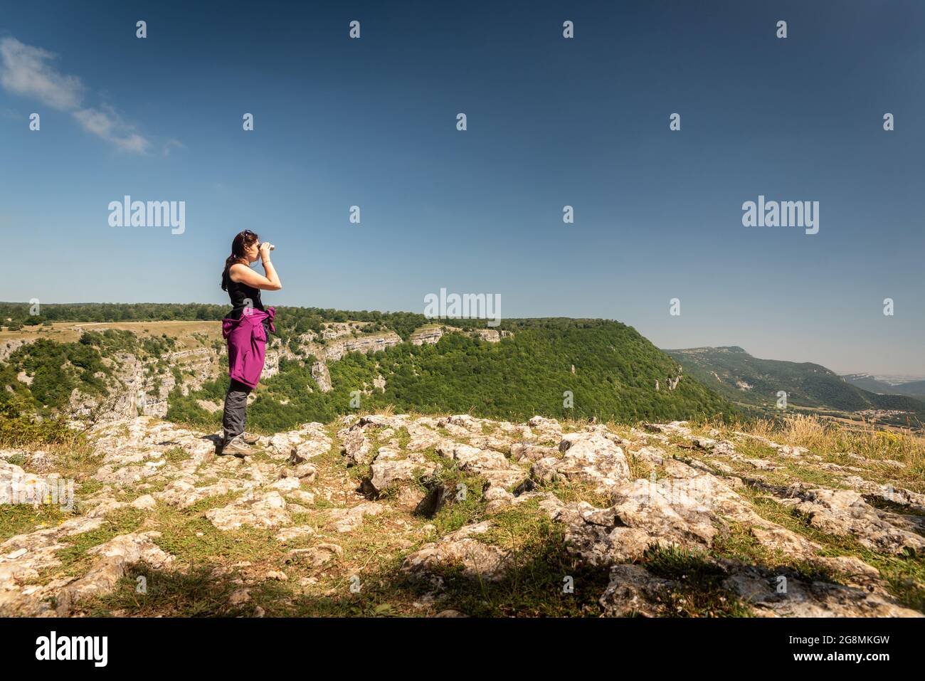 Woman hiking in forest hi-res stock photography and images - Alamy