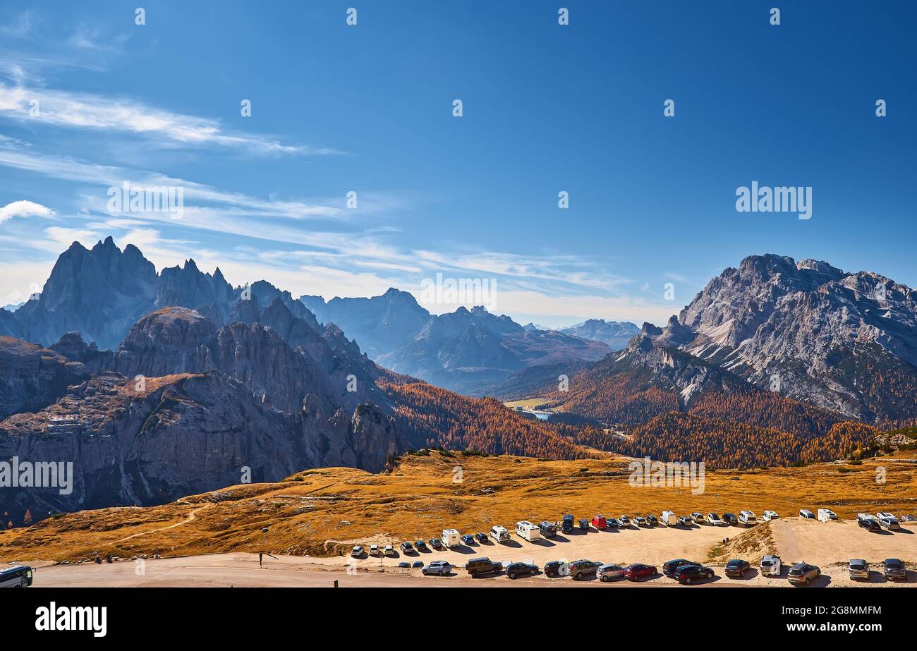 Stunning alpine Landscape at sautumn sunny day. Alpine meadow and road ...