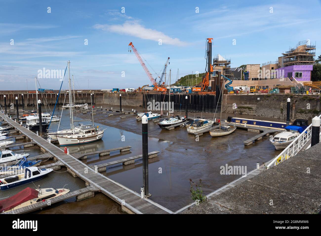 Construction regeneration work at Watchet harbour, Watchet, Somerset, England, UK Stock Photo