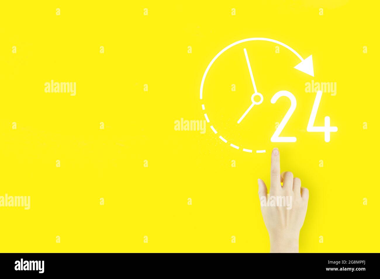 Full time service concept. Young woman's hand finger pointing with hologram 24 7 all day all night icon on yellow background. Business button 24 hours Stock Photo