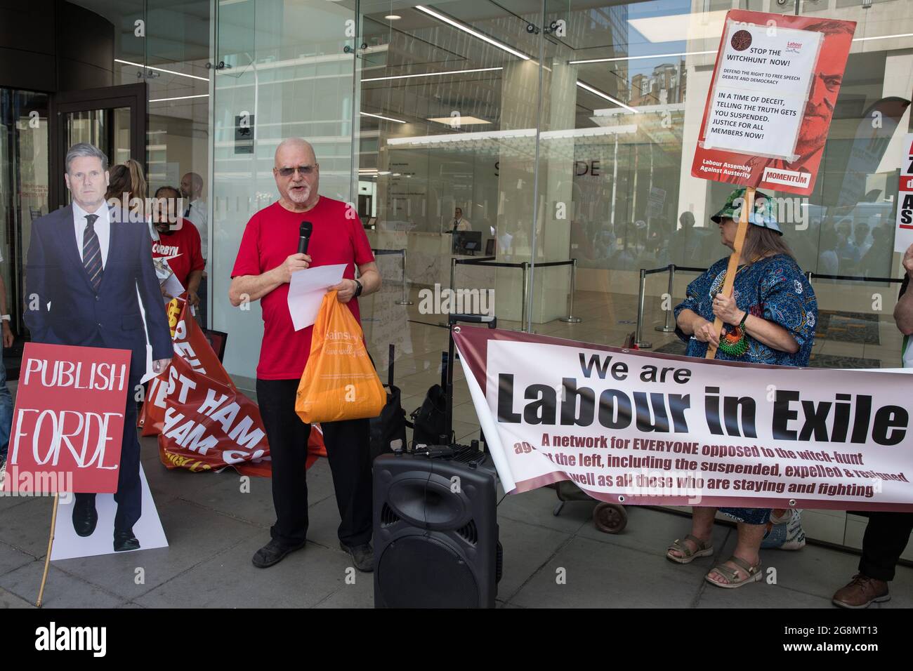 London, UK. 20th July, 2021. Roger Silverman addresses supporters of left-wing Labour Party groups at a protest lobby outside the party's headquarters. The lobby was organised to coincide with a Labour Party National Executive Committee meeting during which it was asked to proscribe four organisations, Resist, Labour Against the Witchhunt, Labour In Exile and Socialist Appeal, members of which could then be automatically expelled from the Labour Party. Credit: Mark Kerrison/Alamy Live News Stock Photo