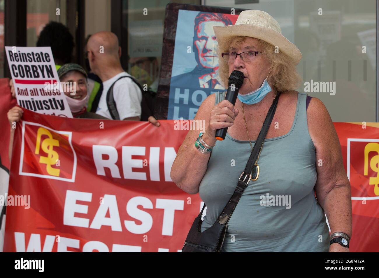 London, UK. 20th July, 2021. Harriet Bradley of Bristol addresses supporters of left-wing Labour Party groups at a protest lobby outside the party's headquarters. The lobby was organised to coincide with a Labour Party National Executive Committee meeting during which it was asked to proscribe four organisations, Resist, Labour Against the Witchhunt, Labour In Exile and Socialist Appeal, members of which could then be automatically expelled from the Labour Party. Credit: Mark Kerrison/Alamy Live News Stock Photo
