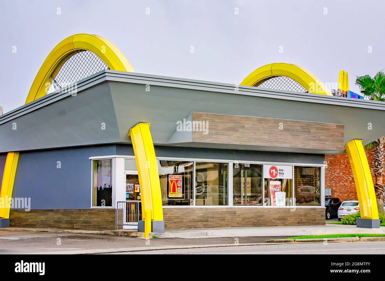 A McDonald’s restaurant features the Golden Arches in the building design, July 18, 2021, in Mobile, Alabama. Stock Photo
