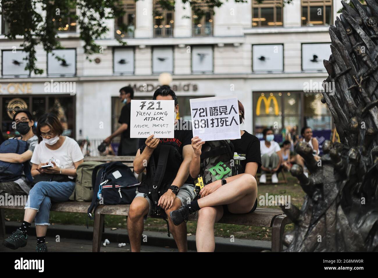 London, UK. 21st July, 2021. Protesters hold placards during the demonstration. Hongkongers in London gathered on the 2nd year anniversary of the 721 Yuen Long Mob Attack to screen the documentary of the events. Credit: SOPA Images Limited/Alamy Live News Stock Photo
