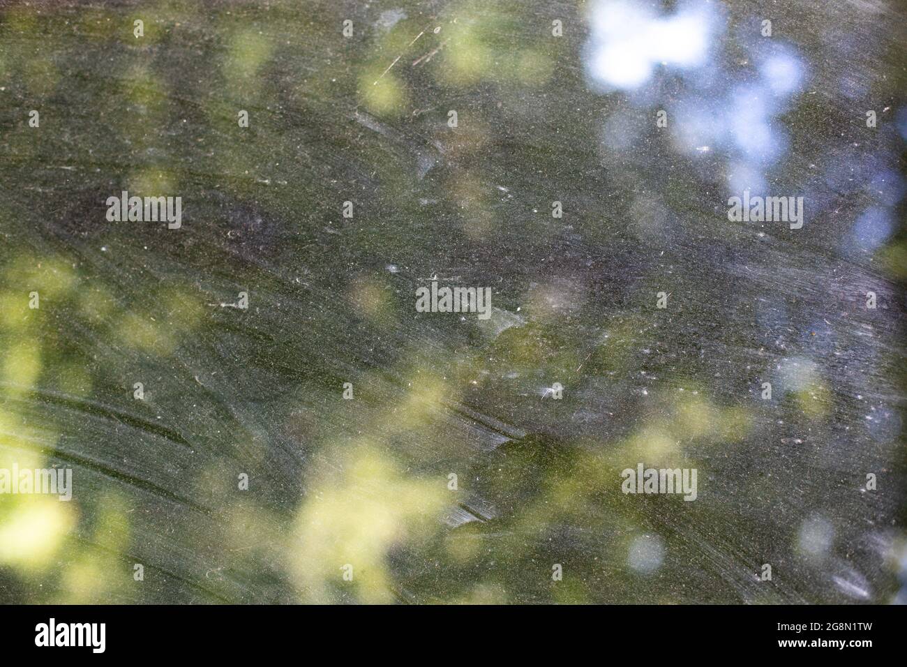 Dirty glass on the window. Cloudy glass covered with dust. Dirty