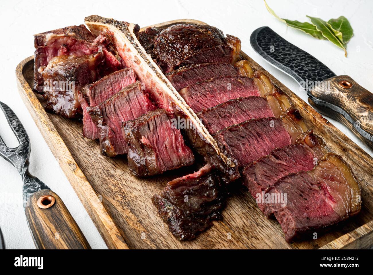Barbecue dry aged Wagyu Porterhouse Steak sliced medium rare