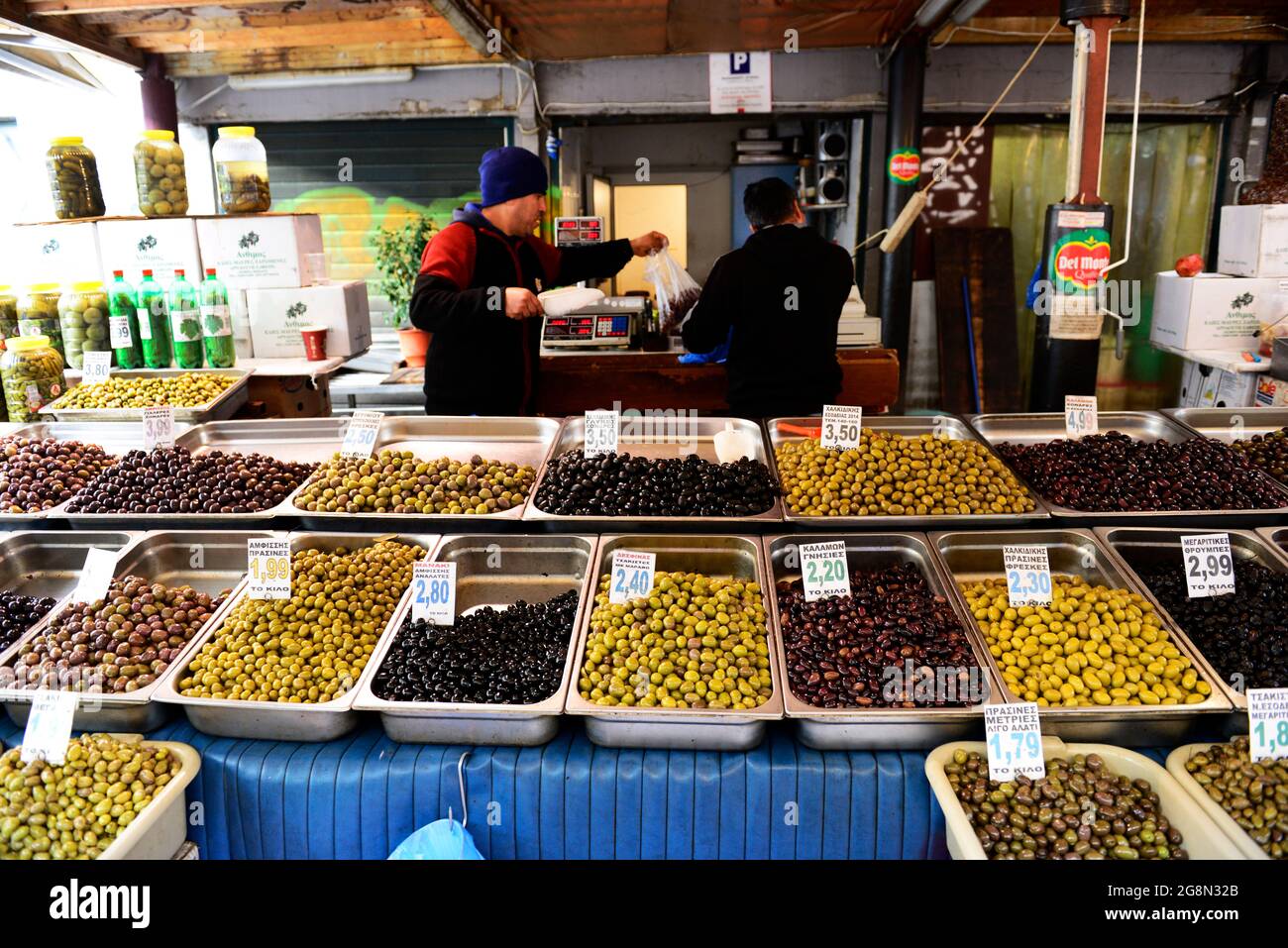 An olive vendor in the central market of Athens, Greece Stock Photo - Alamy