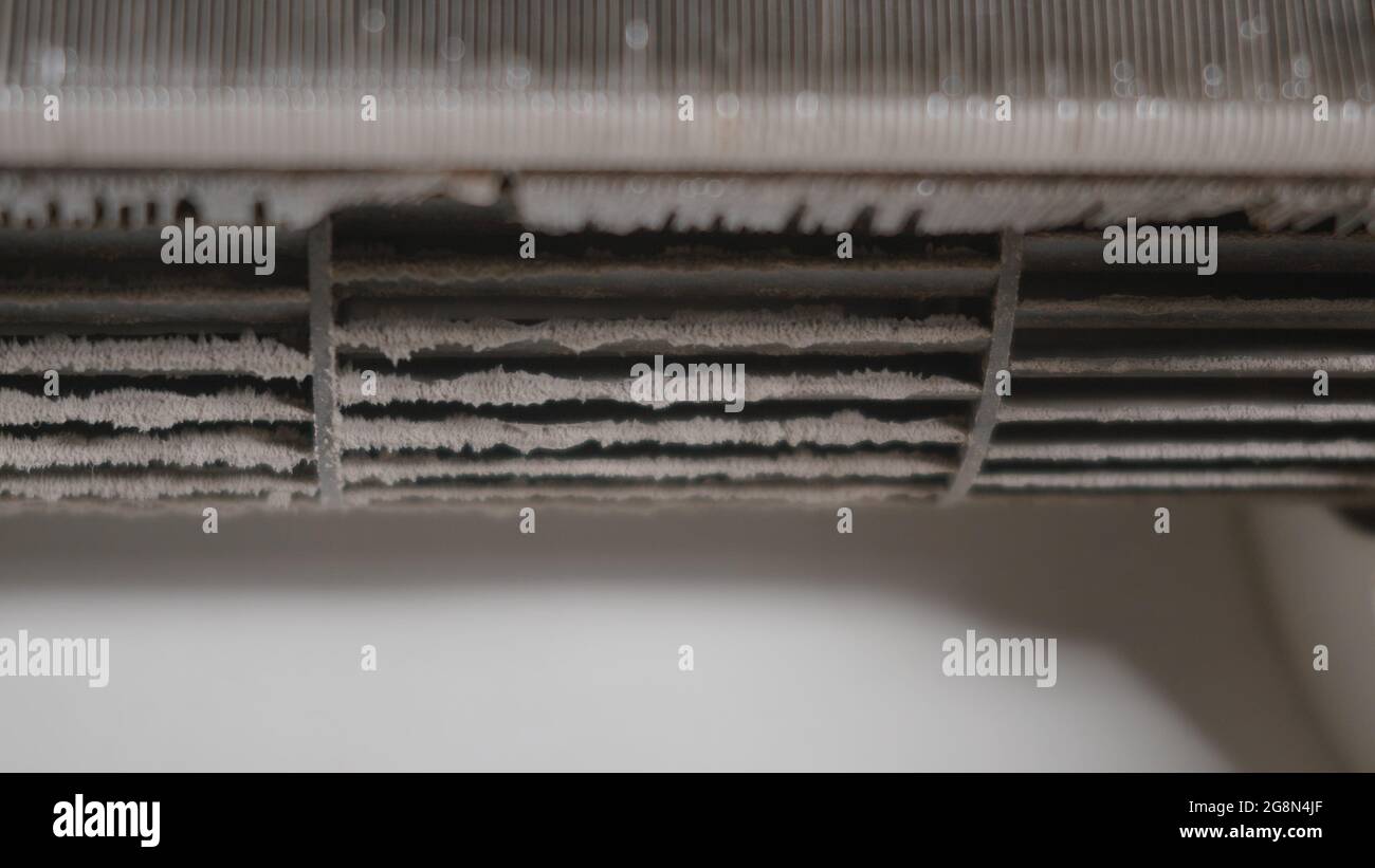 Dirty dust dense on squirrel cage fan in air conditioner indoor at home