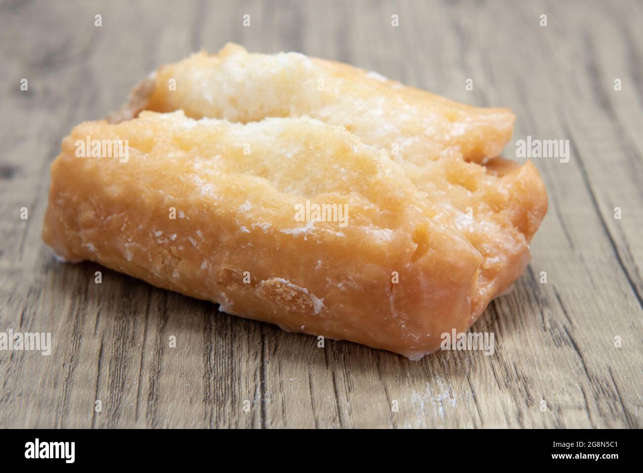 Old fashioned buttermilk bar is textured with glazed coating for a