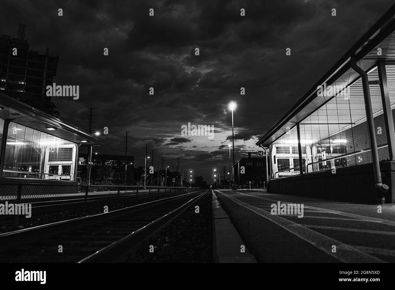 the train station at night 2 ways Stock Photo Alamy