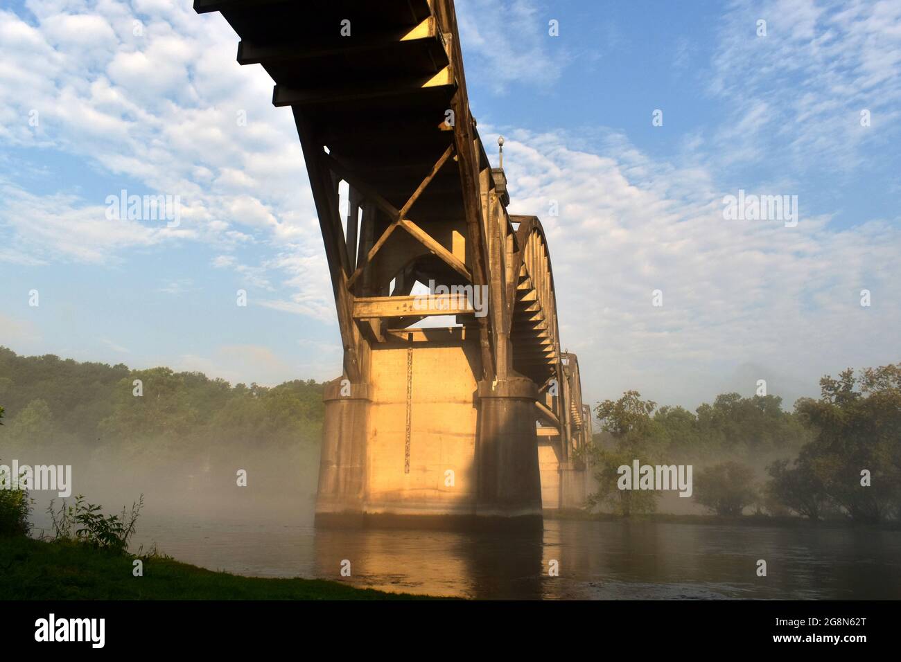 Cotter road Bridge with mist rising off the White River Stock Photo Alamy