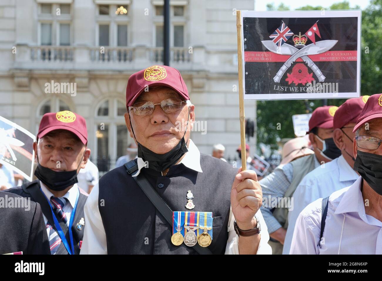 Gurkha veterans gather to protest in Westminsters for pension parity with their British counterparts.  The veterans will also stage a hunger strike. Stock Photo