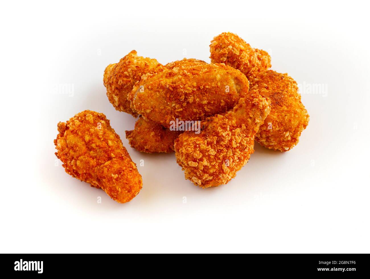 Heap of fried chicken isolated on white background. Stock Photo