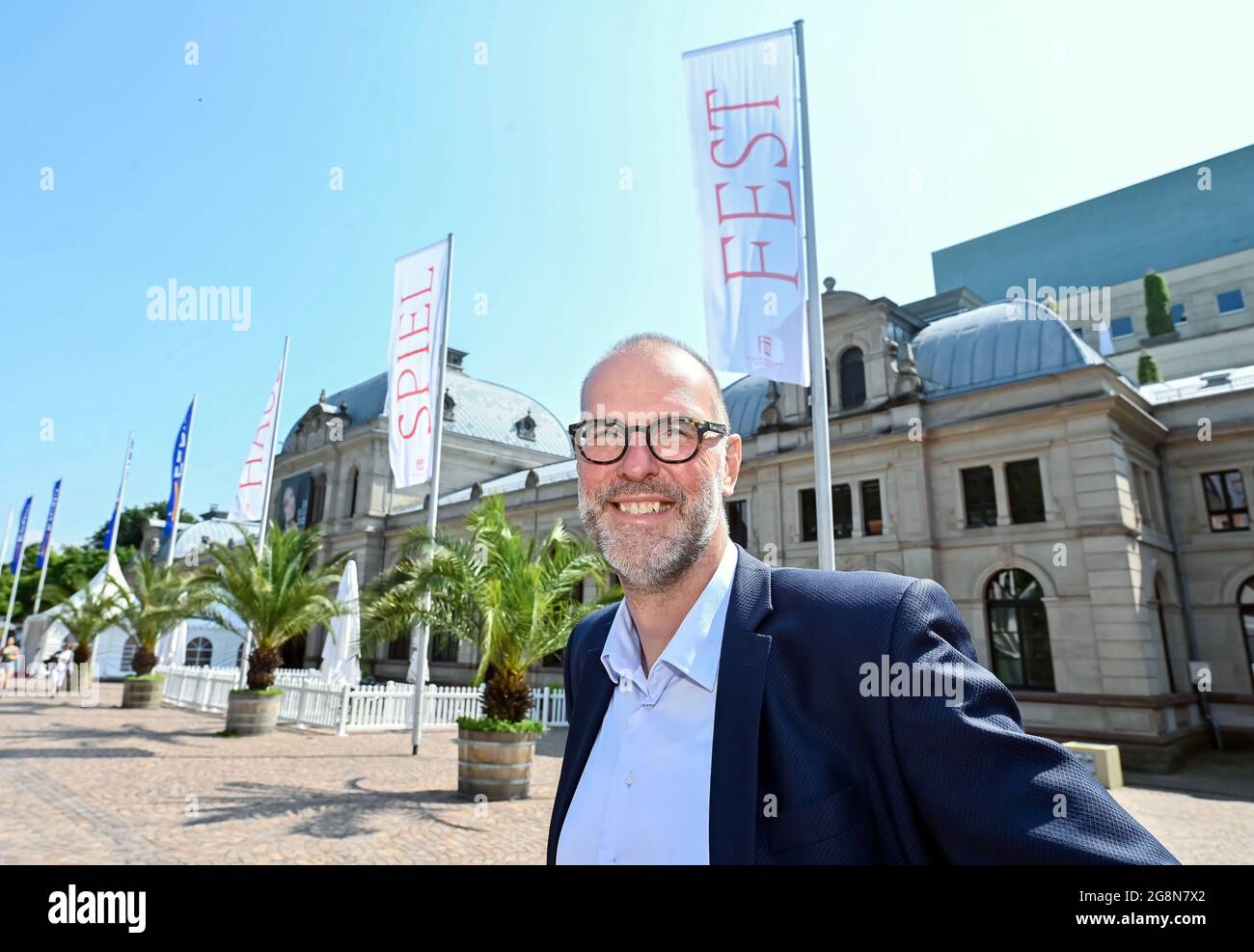 Baden Baden, Germany. 20th July, 2021. Benedikt Stampa, artistic director of the Festspielhaus Baden-Baden, stands in front of the Festspielhaus. As part of a model project of 18 cultural and leisure facilities in Baden-Württemberg, the Festspielhaus is testing the optimal management of visitor flows in times of pandemic. (to dpa-Korr 'Between frustration and euphoria: Festival bosses test what works') Credit: Uli Deck/dpa/Alamy Live News Stock Photo
