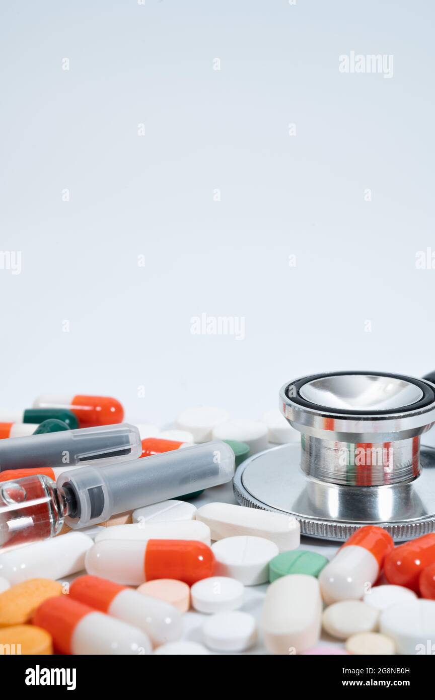 Medical concept with different types of medicines on white background