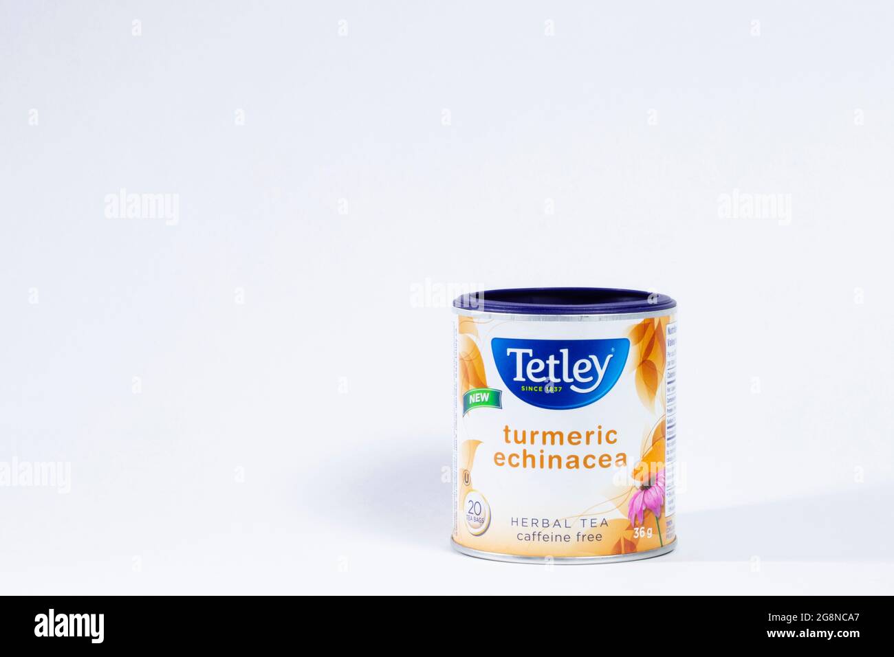 A container of natural herbal teabags made from turmeric and echinacea. Tetley is a major tea bag manufacturer. Stock Photo