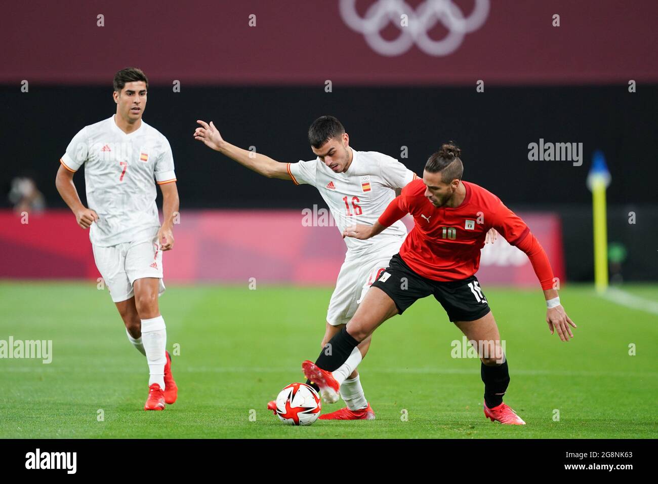 Sapporo, Japan. 22nd July, 2021. Pedri Gonzalez (16 Spain) and Ramadan Sobhi (11 Egypt) battle for the ball (duel) during the Men's Olympic Football Tournament Tokyo 2020 match between Egypt and Spain at Sapporo Dome in Sapporo, Japan. Credit: SPP Sport Press Photo. /Alamy Live News Stock Photo