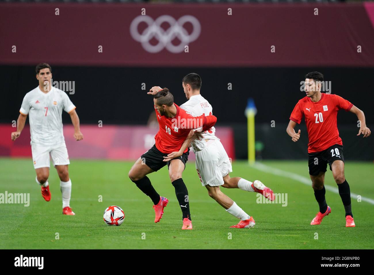 Sapporo, Japan. 22nd July, 2021. Ramadan Sobhi (10 Egypt) and Pedri Gonzales (16 Spain) battle for the ball (duel) during the Men's Olympic Football Tournament Tokyo 2020 match between Egypt and Spain at Sapporo Dome in Sapporo, Japan. Credit: SPP Sport Press Photo. /Alamy Live News Stock Photo