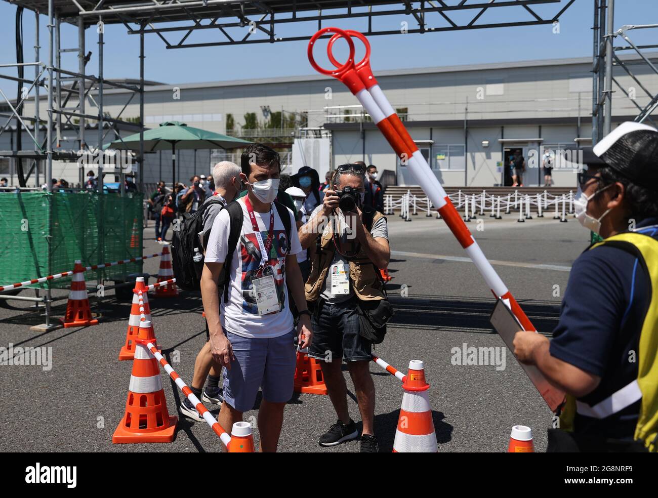 Tokyo Japan July 22 21 Journalists Queue To Board A Bus Bound For The Main Press Centre Of The Summer Olympics Tokyo Was To Host The Summer Olympic Games