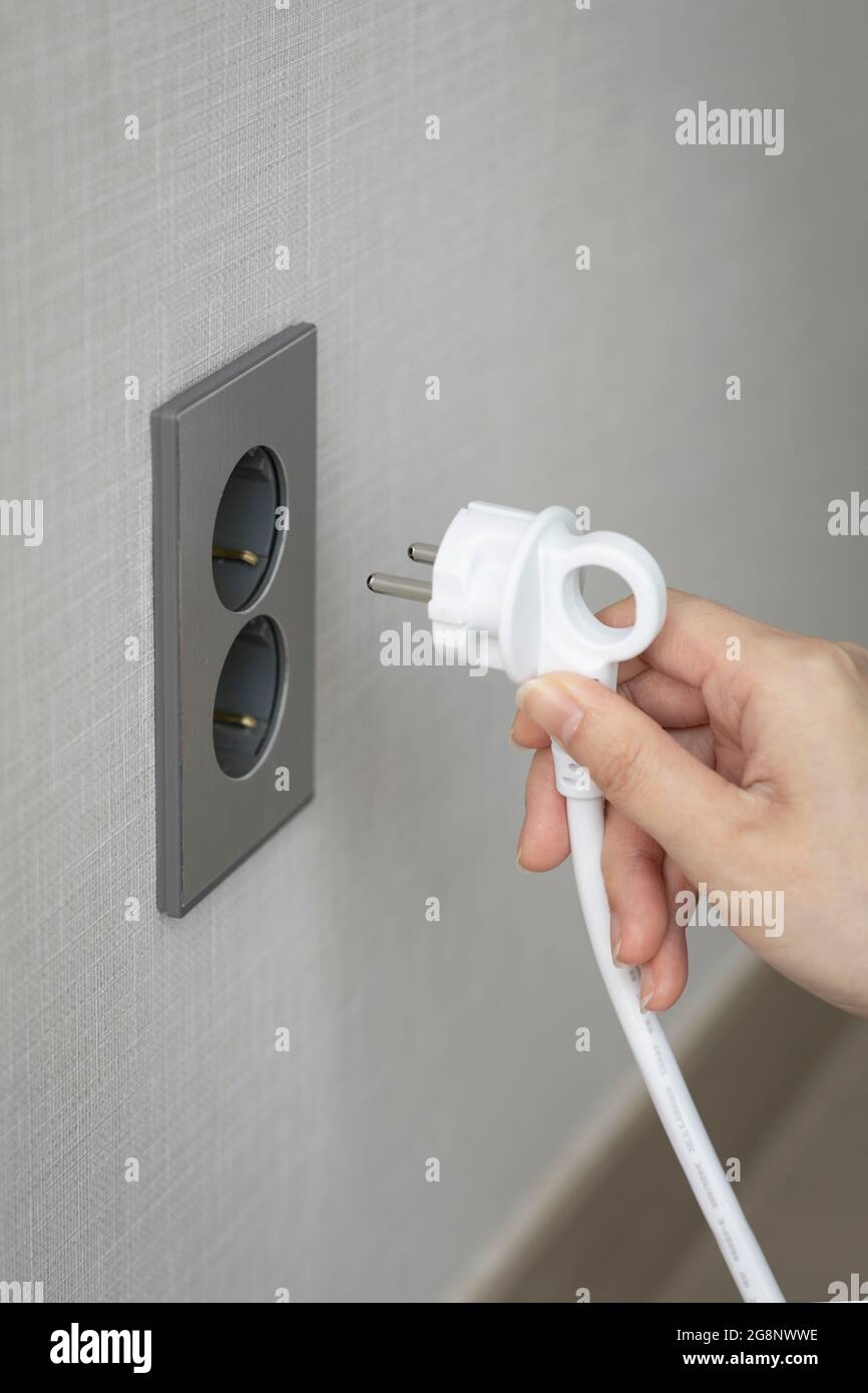plugging power socket, outlet Stock Photo Alamy