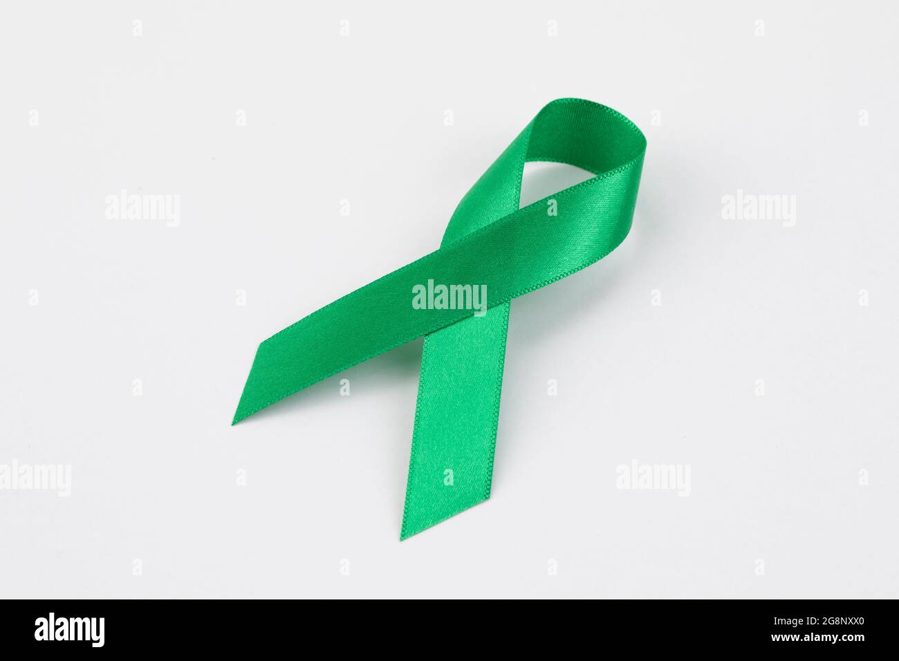 green ribbon on white background Stock Photo Alamy